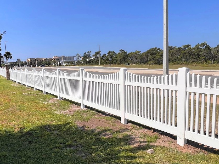 Photo of a vinyl picket fence