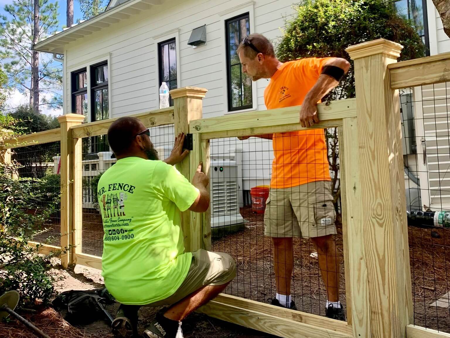 Photo of Panama City fence company installing a wood fence