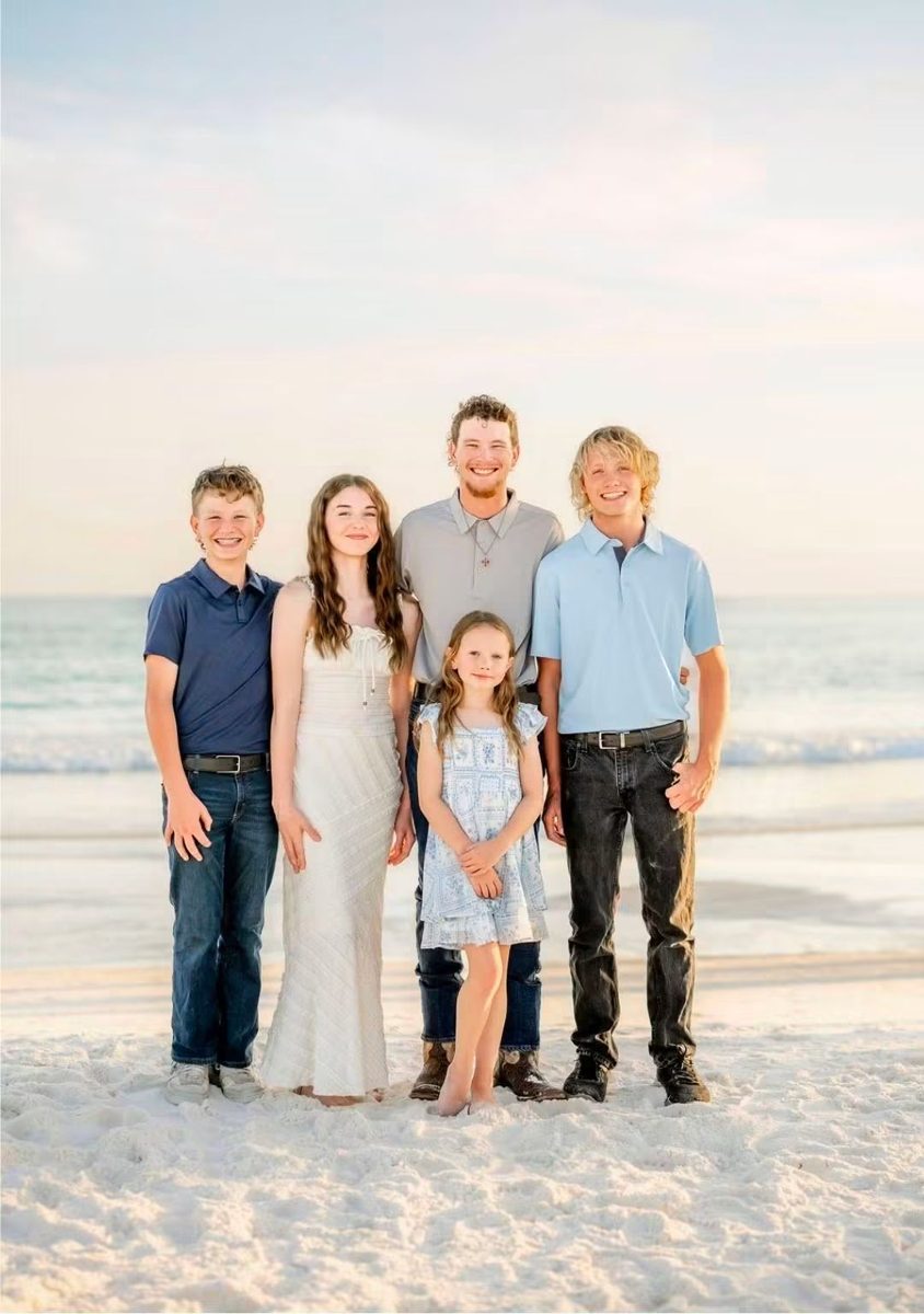 Joshua Glover's kids standing together on Panama City Beach