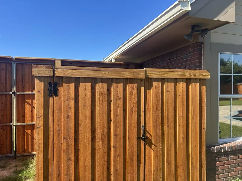 Stained board-on-board gate enclosure