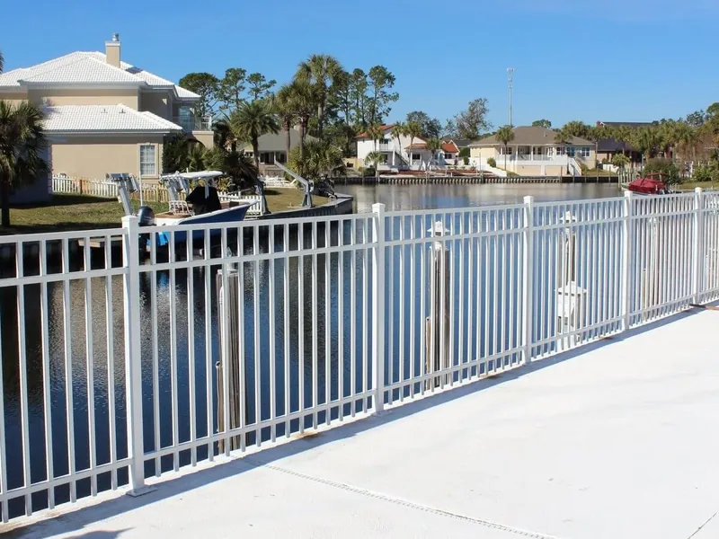 White aluminum railing on a waterfront walk