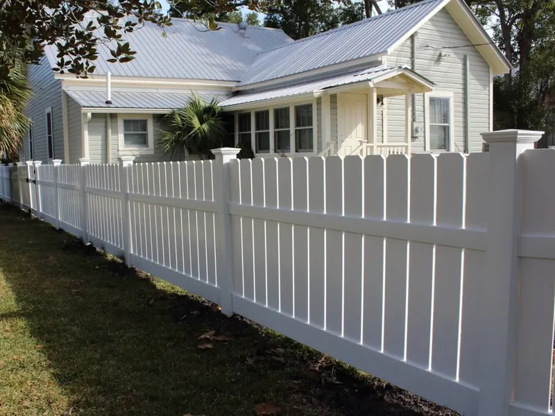 White vinyl picket-top fence